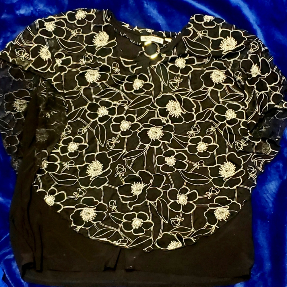 Women's shirt size XL. Sheer with built in undershirt